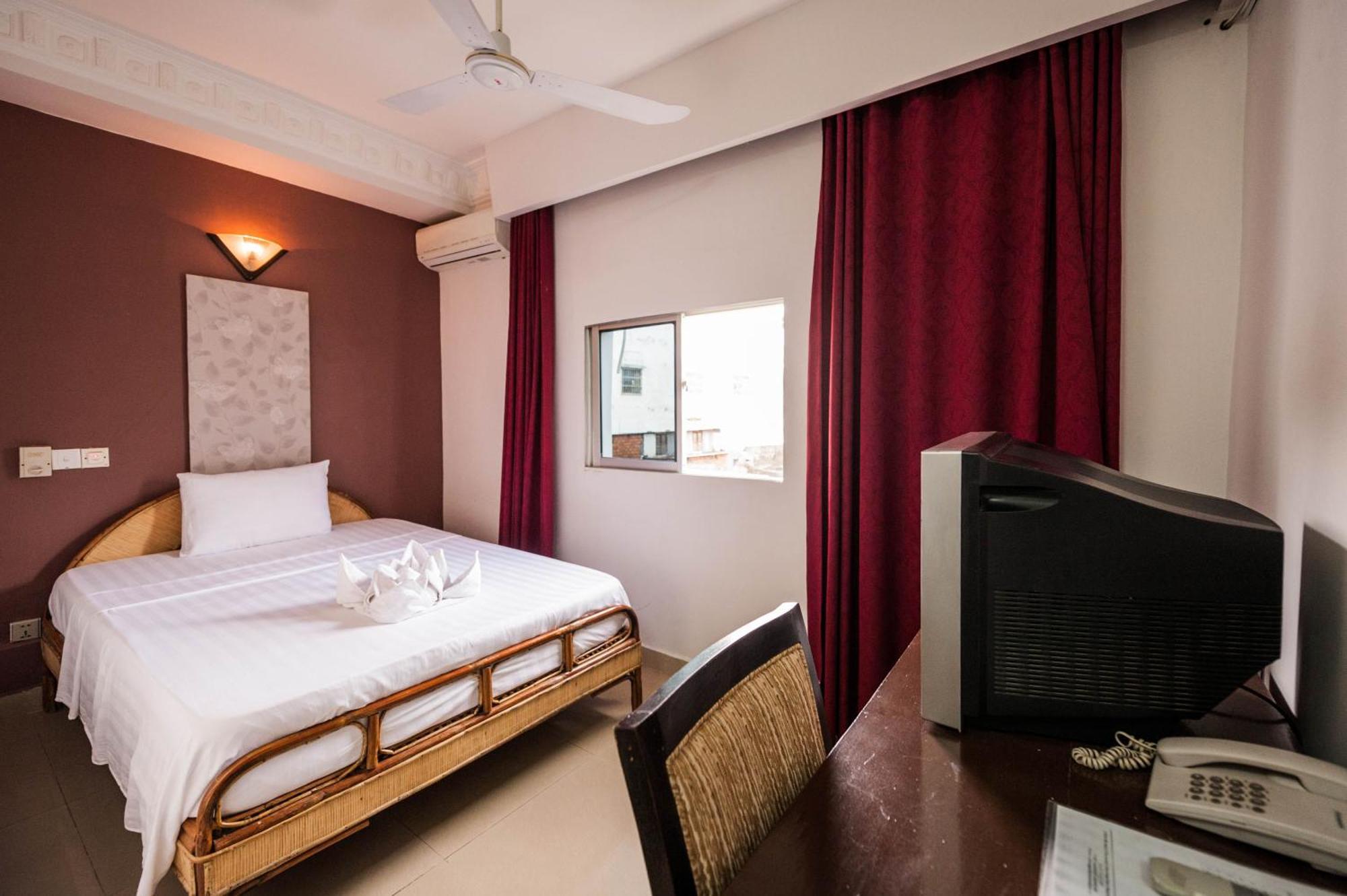 Angkor International Hotel Phnom Penh Quarto foto